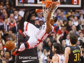 Raptors' DeMar DeRozan dunks the ball against the Hawks during first half NBA action at the Air Canada Centre in Toronto on Thursday, March 10, 2016. (Stan Behal/Toronto Sun)