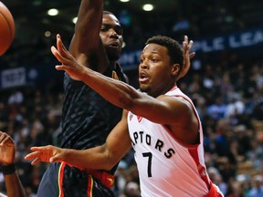 Raptors guard Kyle Lowry (right) in action against the Hawks at the Air Canada Centre in Toronto on Thursday, March 10, 2016. (Stan Behal/Toronto Sun)