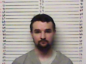 In this undated file photo provided by the Stephens County, Okla., Sheriff's Office, Alan Hruby is pictured in a booking photo. Hruby has avoided a possible death sentence by pleading guilty to first-degree murder in the 2014 shooting deaths of his sister and parents. (Stephens County Sheriff's Office via AP, file)