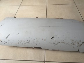 A piece of debris found by a South African family off the Mozambique coast in December 2015, which authorities will examine to see if it is from missing Malaysia Airlines flight MH370, is pictured in this handout photo released to Reuters, on March 11, 2016. (REUTERS/Candace Lotter/Handout via Reuters)