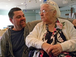 Ernst Kuglin/The Intelligencer  
Grandson Dave Lovely was just one of many family members and friends to wish Frances Grant a 100th birthday. The centenary birthday party was held Friday at the Salvation Army Church in Trenton.