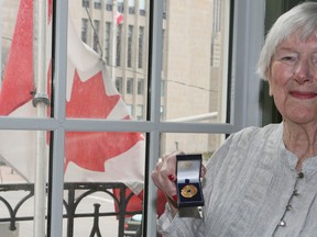 Theo Hopkinson 89, was presented with a Bletchley Park Medal on Friday. She helped decipher Nazi codes during the Second World War. (Veronica Henri/Toronto Sun/Postmedia Network)