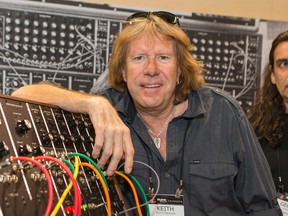 In this Jan. 23, 2015 file photo, Keith Emerson attends the 2015 National Association of Music Merchants  (NAMM) show in Anaheim, Calif. Emerson, the keyboardist and founding member of the 1970s progressive rock group Emerson, Lake and Palmer, died Thursday, March 10, 2016, at home in Santa Monica, Calif. He was 71.  (Photo by Paul A. Hebert/Invision/AP, File)