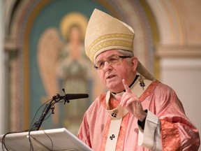 Cardinal Thomas Collins, the Archbishop of Toronto, delivers a statement on physician-assisted death while presiding over mass at St. Paul's Basilica in Toronto on Sunday, March 6. THE CANADIAN PRESS/Peter Power