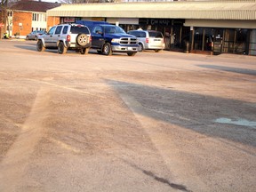 Heavy tire tracks can be seen near The Harp Bar and Grill on Saturday, March 12, 2016.