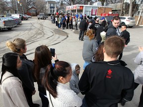 A long lineup on the opening day at the Bridge Drive-In on Jubilee Avenue in Winnipeg on Sat., March 12, 2016. Kevin King/Winnipeg Sun/Postmedia Network
