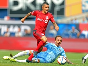 TFC’s Sebastian Giovinco carries the ball during a game against New York City FC at Yankee Stadium last July. (Getty Images/AFP)