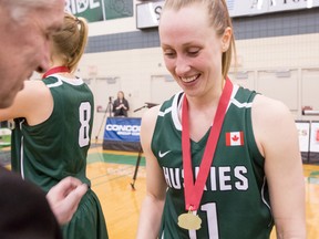 Laura Dally and the Saskatchewan Huskies won the Canada West Universities Athletic Association women's basketball championship with a 73-62 victory over the Regina Cougars Saturday night on home court. Dally, a 23-year-old Bright's Grove native, was named Canada West's outstanding player prior to the final four. (GetMyPhoto.ca/Handout)