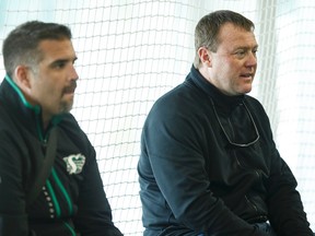 Saskatchewan Roughriders vice president of football operations general manager & head coach Chris Jones (right), and former Edmonton Eskimos head coach, watches during the CFL Regional Combine held at Commonwealth Recreation Centre in Edmonton, Alta., on Monday March 7, 2016. Players who moved on will attend the national combine. (Ian Kucerak/Edmonton Sun)