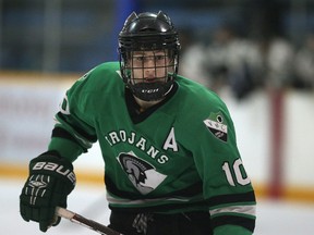 Vincent Massey Trojans forward Jack Cowell skates against the Dauphin Clippers during the provincial 4A high school hockey championships at the St. James Civic Centre in Winnipeg on Fri., March 11, 2016. Kevin King/Winnipeg Sun/Postmedia Network