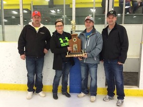 Karen Selte accepts the Stan Hartwell Memorial Trophy given annually to the top volunteer for the Vermilion Minor Hockey Association.