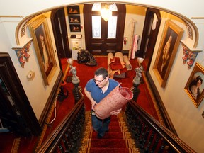 Luke Hendry/The Intelligencer
Antoine Azzopardi carries another role of new carpet up the staircase of Glanmore National Historic Site in Belleville. The carpet is a reproduction of the 1880s-era carpet which once lined the museum's floors.