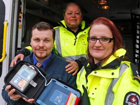 Jason Miller/The Intelligencer
Broadcaster Tim Durkin and St. John Ambulance volunteers Sharon Heenan (centre) and Lisa Butcher were part of team that resuscitated Michael Sanderson after he went into cardiac arrest on Saturday, March 12.