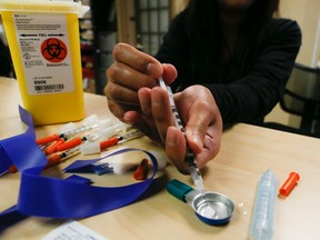 Toronto health officials release their report calling for safe-injection sites in Toronto on Monday, March 14, 2016. (Stan Behal/Toronto Sun)