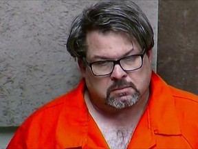 Uber driver Jason Dalton, suspected of killing six people and wounding two others, is seen on closed circuit television during his arraignment in Kalamazoo County, Michigan, in this February 22, 2016 file photo. (REUTERS/Kalamazoo County Court/Handout via Reuters)