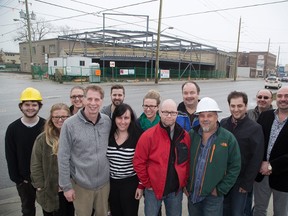 Pathways Skill Development and York Developments staffers gather Monday in front of the campus expansion under construction at Clarence and Horton streets in London. From left are Jeff Dowler, Stephenie Terris, Becky Strong, Paul Hubert, Jonathan Wright, Kim Catalano, Amy Sarrasin, Chris Goss, Kevin Bennett, Neil Suter, Carlos Ramirez, Sam Soufan and Ali Soufan. (DEREK RUTTAN, The London Free Press)