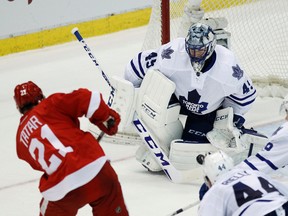 Toronto Maple Leafs goalie Jonathan Bernier stops a shot by Detroit Red Wings' Tomas Tatar, during the third period of an NHL game March 13, 2016, in Detroit. Bernier made 38 saves to shut out the Red Wings, 1-0. (DUANE BURLESON/AP)