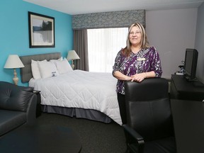 Shelley Peever, general manager of the Lexington Hotel, shows off a renovated room at the hotel on Brady Street on Monday. (John Lappa/Sudbury Star)