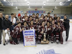Members of the St. Paul’s Crusaders celebrate their provincial championship victory over the Vincent Massey Trojans on Monday night at the St. James Civic Centre. It’s their third provincial title in the last five years. RUSTY BARTON/Manitoba High Schools Athletic Association