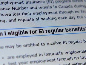 Canada Service centre documents that display Employment Insurance options are pictured in Ottawa in this July 7, 2015 file photo. Newly released figures show jobless Canadians are waiting days for answers to their employment insurance questions, and a month or more to find out if they are going to receive benefits. (THE CANADIAN PRESS/Sean Kilpatrick)