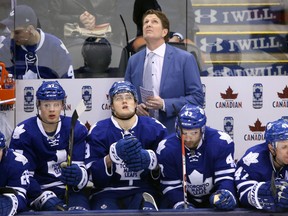 Toronto Maple Leafs head coach Mike Babcock and center William Nylander (39) look on from the bench on March 5, 2016. (Tom Szczerbowski-USA TODAY Sports)