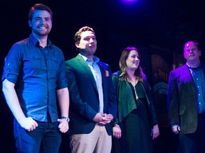 NDP MLAs, left to right, Michael Connolly (Calgary-Hawkwood), Ricardo Mirando (Calgary-Cross),  Deborah Drever (Calgary-Bow) and Cameron Westhead (Banff-Cochrane) stand onstage during Banff PRIDE festivities in Banff, Alta. on Saturday, Oct. 3, 2015. (Daniel Katz/ Crag & Canyon/ Postmedia Network)