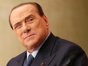 Silvio Berlusconi said Tuesday that a woman could not handle being a mother and mayor of Rome,. (AP Photo/Alessandra Tarantino, Files)