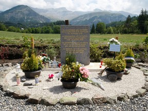 In this July 24, 2015, file photo, a monument is seen in the area near where a Germanwings aircraft crashed in the French Alps, in Le Vernet, French Alps. U.S. safety regulators initially declined to grant medical clearance for German pilot Andreas Lubitz who five years later deliberately flew an airliner full of people into a mountainside in the French Alps. A lawyer for victims' families says they missed a chance to head off the disaster. (AP Photo/Claude Paris, File)