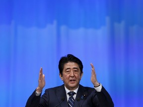 Japan's Prime Minister Shinzo Abe delivers his speech during the ruling Liberal Democratic Party (LDP) annual convention in Tokyo, Japan, March 13, 2016. REUTERS/Yuya Shino