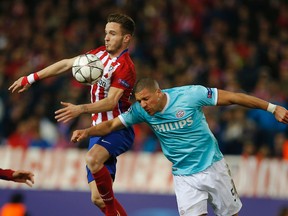 PSV’s Jeffrey Bruma, right, battles for the ball with Atletico’s Antoine Griezmann during the Champions League match at the Vicente Calderon stadium in Madrid Tuesday, March 15, 2016. (AP Photo/Paul White)