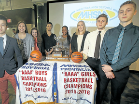 Representatives of the teams involved in the AAAA Manitoba high school basketball championships pose at a press conference Tuesday.