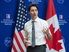 Prime Minister Justin Trudeau addresses students at American University, Friday, March 11, 2016 in Washington. THE CANADIAN PRESS/Paul Chiasson