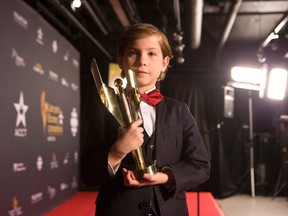 Jacob Tremblay holds the award for Performance by an Actor in a Leading Role at the Canadian Screen Awards in Toronto on Sunday evening, March 13, 2016. (THE CANADIAN PRESS/Chris Young)