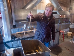 Louis-Robert Handfield, owner of Domaine Handfield sugar shack, boils some maple syrup, Thursday, March 10, 2016 in Saint Marc-sur Richilieu, Que.THE CANADIAN PRESS/Ryan Remiorz