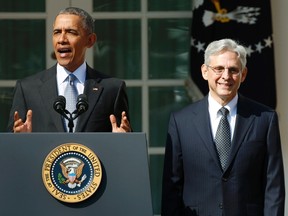 U.S. President Barack Obama, left, announces Judge Merrick Garland, right, as his nominee to the U.S. Supreme Court, in the White House Rose Garden in Washington, March 16, 2016. (REUTERS/Kevin Lamarque)