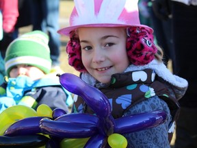 Cheyanne Wilcox, 7, of Petrolia, sports an Easter hat and a balloon bicycle she picked up during last year's Easter in the Park at Canatara Park in Sarnia. This year's Easter in the Park is set for March 26, 9 a.m. to 12:30 p.m., and is just one of several Easter events for children planned for Sarnia-Lambton in the coming days. (File photo/Sarnia Observer)