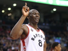 Toronto Raptors center Bismack Biyombo (8) wags his finger after blocking a shot by Atlanta Hawks player Paul Millsap (not pictured) at Air Canada Centre. The Raptors beat the Hawks 104-96. Tom Szczerbowski-USA TODAY Sports