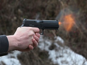 Coun. Jody Mitic shoots at a firing range Wednesday, March 16, 2016.