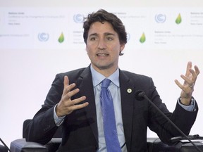 Canadian Prime Minister Justin Trudeau speaks during a session on carbon pricing at the United Nations climate change summit, Monday November 30, 2015 in Le Bourget, France. (THE CANADIAN PRESS/Adrian Wyld)