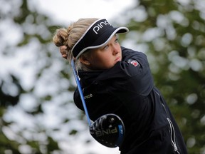 Brooke Henderson of Canada plays on the 15th hole during the second round of the Evian Championship women's golf tournament in Evian, eastern France, Friday, Sept. 11, 2015. (AP Photo/Laurent Cipriani)
