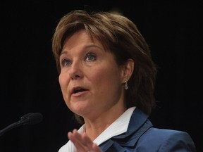 B.C. Premier Christy Clark speaks with the media. (THE CANADIAN PRESS/Adrian Wyld)