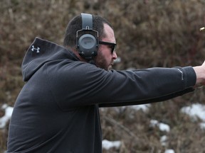 Ottawa city Councillor Jody Mitic brought his new guns to the Stittsville Shooting Range in Stittsville Wednesday, March 16, 2016.