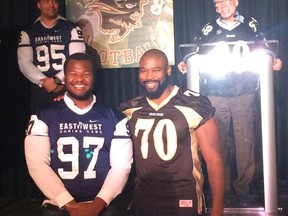Izzy Idonije (right) poses with Bisons defensive lineman David Onyemata, who could be the next U of M player to suit up in the NFL. Both players are Nigerian born and both learned football at a late age. “It’s incredible, isn’t it,” Idonije asks.