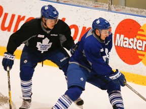 Zach Hyman (right) and Jake Gardiner of the Toronto Maple Leafs take part in a team workout at the MasterCard Centre in Toronto on March 16, 2016. (STAN BEHAL/Toronto Sun)