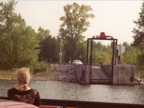 The Quyon Ferry pulls up to the dock on the Ontario side of the Ottawa River.