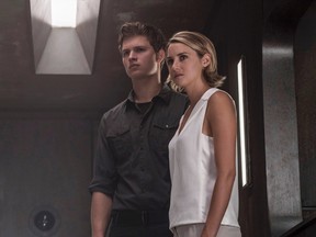 This image released by Lionsgate shows Ansel Elgort, left, and Shailene Woodley in a scene from "The Divergent Series: Allegiant." (Murray Close/Lionsgate)