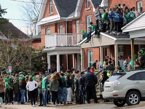 St. Patrick's Day celebrations on Aberdeen Street near Queen's University at approximately 11:20 a.m. in Kingston, Ont. on Thursday March 17, 2016. Steph Crosier/Kingston Whig-Standard/Postmedia Network