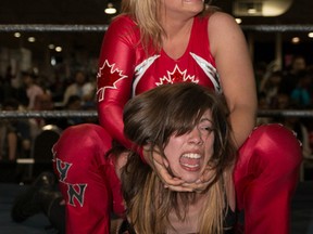 Kaitlin Diemond puts a submission hold on Skyler Rose during Anime North action. (Photo courtesy Tabercil Photography)