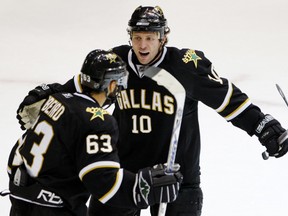 Dallas Stars Brenden Morrow (R) celebrates his goal with teammate Mike Ribeiro against the Detroit Red Wings during the third period in Game 4 of their NHL Western Conference Final hockey series in Dallas, Texas, May 14, 2008.