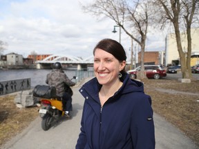 Jason Miller/The Intelligencer
City project manager Deanna O'Leary, pictured here on the Waterfront Trail in downtown Belleville, is spearheading plans to add more than a kilometre of paved paths to the city's bike lane network in 2016.